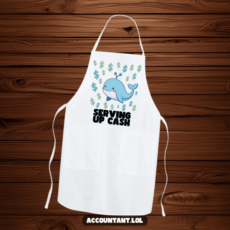 Funny smiling blue whale swimming through a sea of floating dollar signs, worn as a kitchen apron.