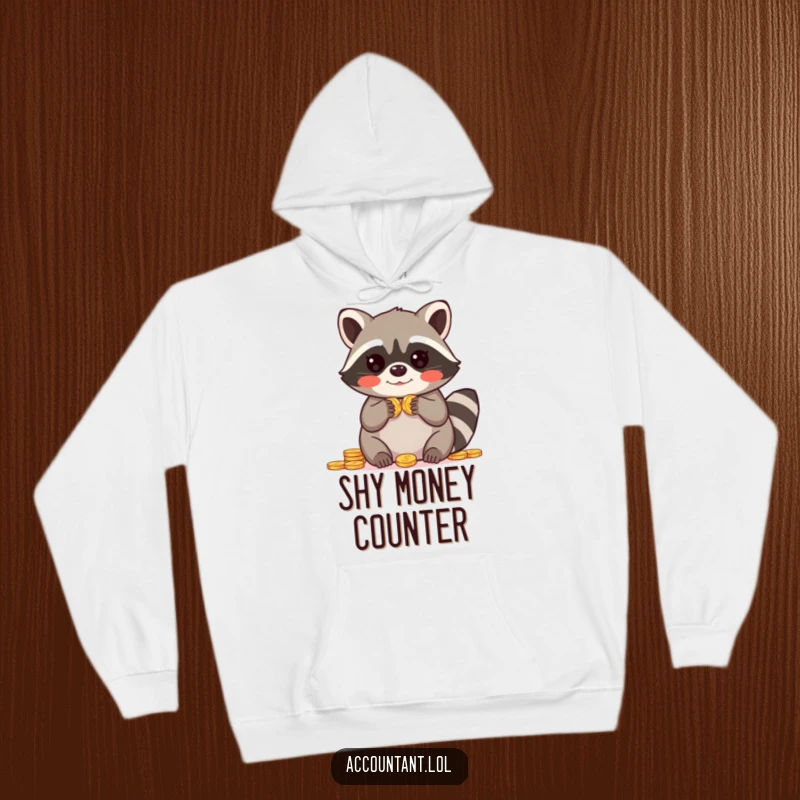 Funny hoodie showing a blushing raccoon with paws up in amazement, surrounded by a pile of counted coins.