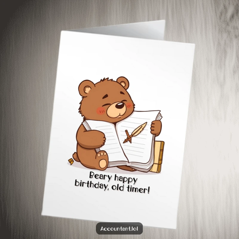 Funny Free Printable Bear Birthday Card: A determined brown bear scribbles furiously on a ledger with a quill, wishing you a wild Happy Birthday.