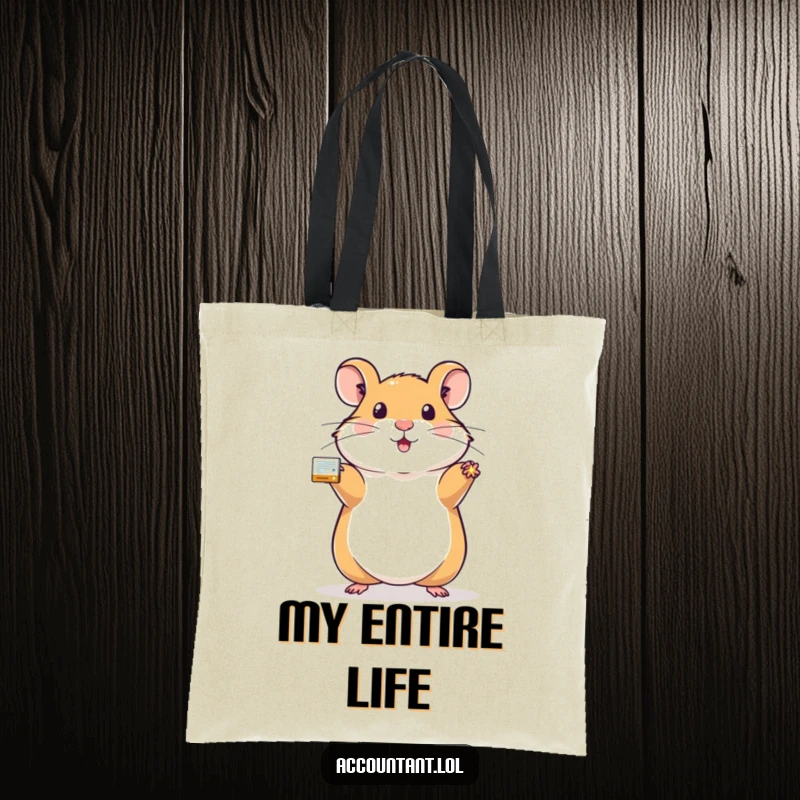 Funny hamster tote bag featuring a proud hamster holding a sparkling, balanced ledger, ideal for carrying essentials humorously.